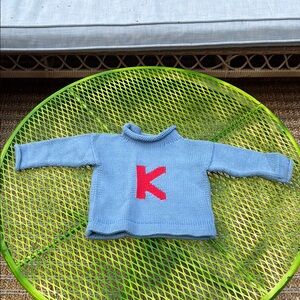 Blue Sweater with Red Letter K